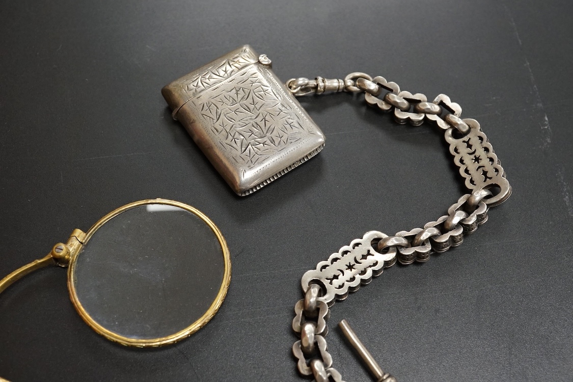 A small group of assorted jewellery and other items including a Victorian white metal albert, hung with a silver vesta case, a pair of gilt metal lorgnettes, cufflinks, scarab brooch and a white metal propelling pencil,